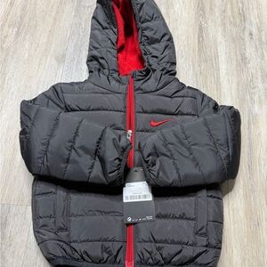 Nike Kids Black Puffer Jacket with Red Lining and Red Swoosh